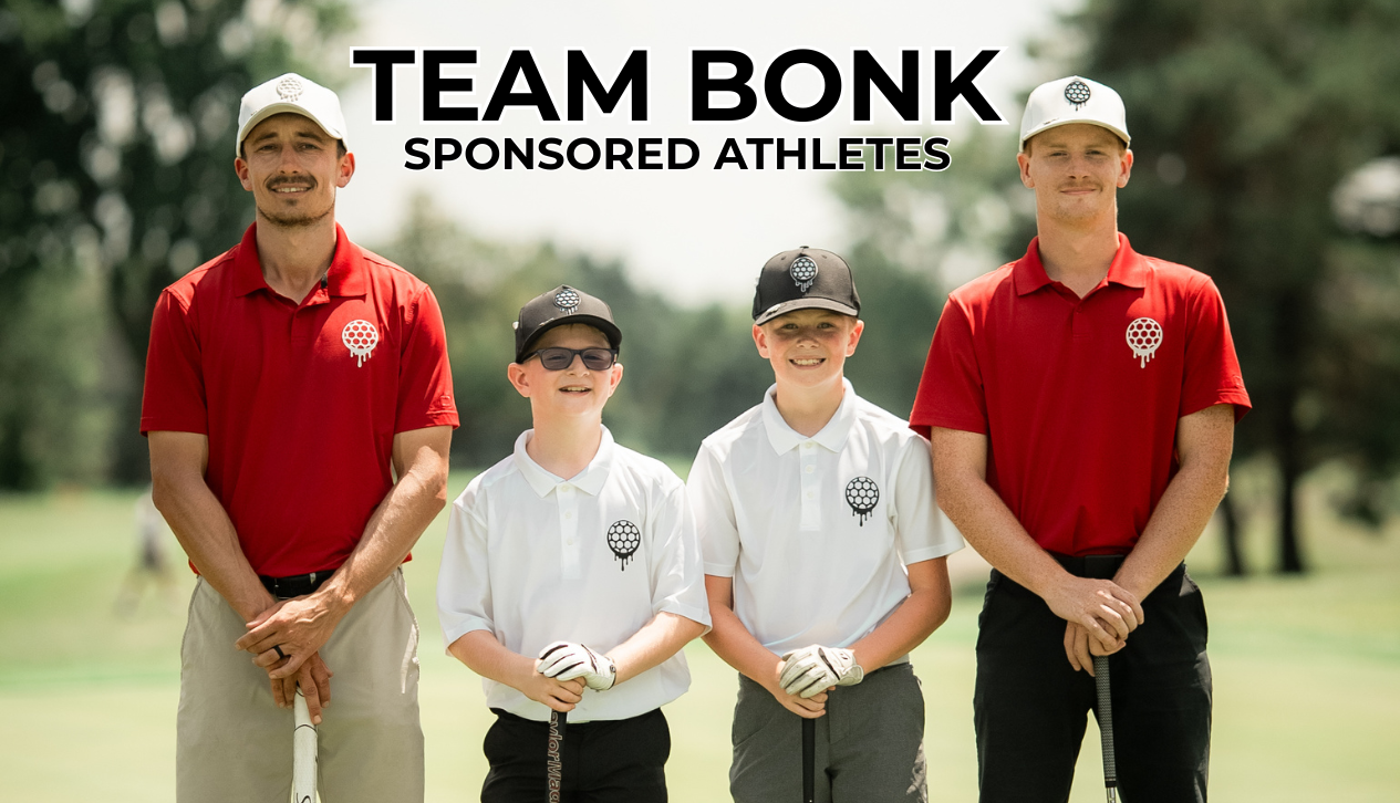 Four golfers posing with clubs, wearing matching logo apparel.