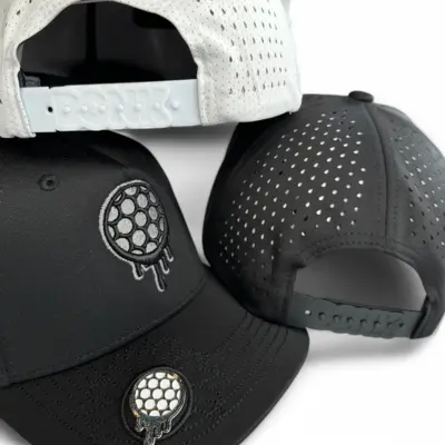 Three perforated caps, two black and one white, with a dripping golf ball logo.