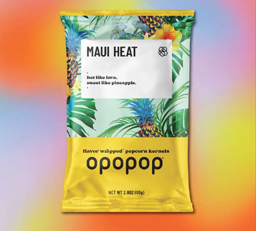 Colorful popcorn packaging with tropical design and 'Maui Heat' text.