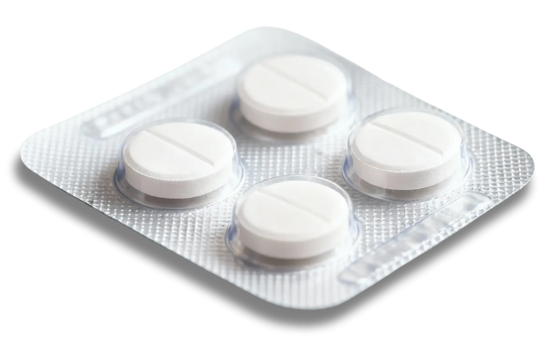 Pack of four white round tablets in a blister pack.