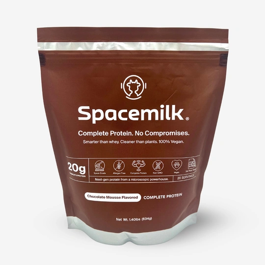 Brown Spacemilk protein powder package, chocolate mousse flavor, 20g protein, vegan.