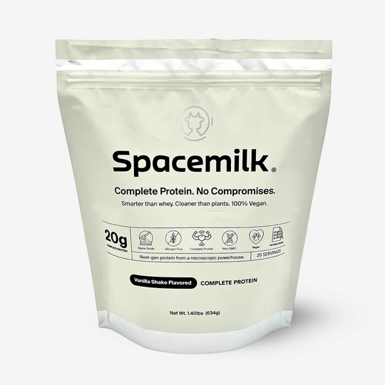 White Spacemilk protein powder pouch with product information and icons.