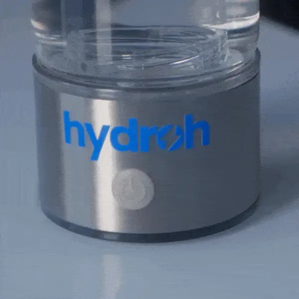 Close-up of a metallic container labeled 'hydroh' with a water symbol.