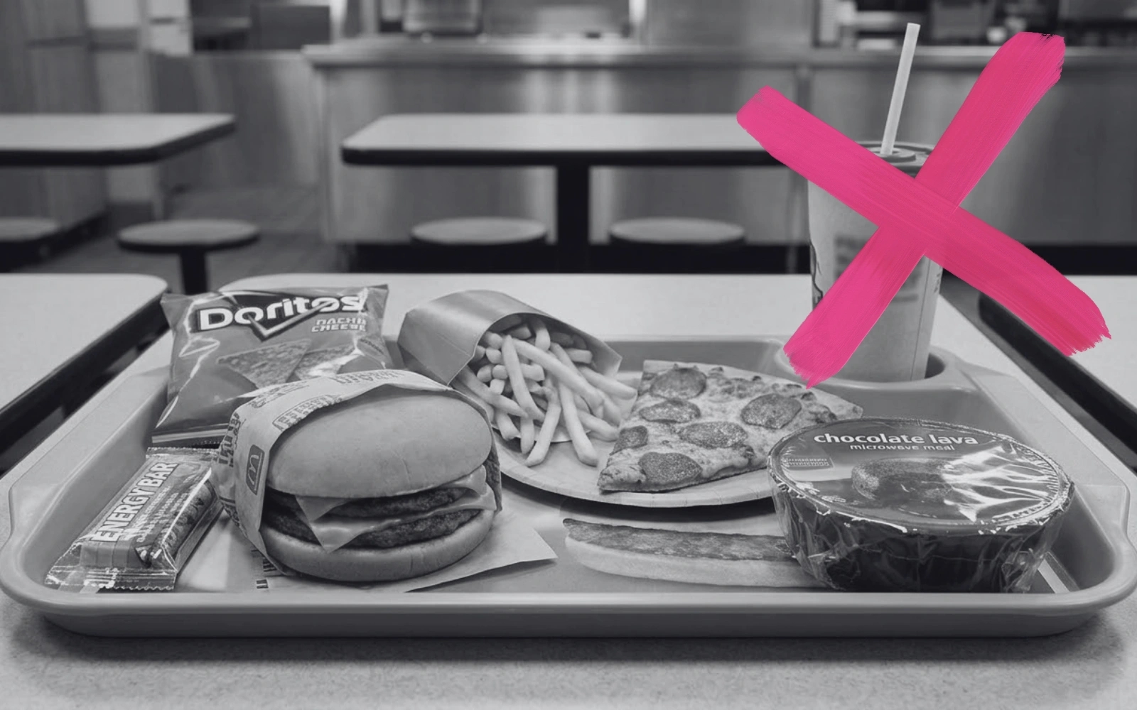 A black and white photo of a tray of fast food with a pink X over the drink.