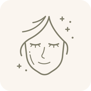 A line art icon of a serene face with closed eyes and sparkles.