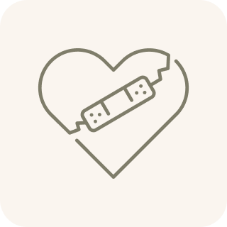 An icon of a broken heart being held together by a bandage.