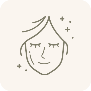 A line drawing icon of a serene face with closed eyes and sparkles around it.
