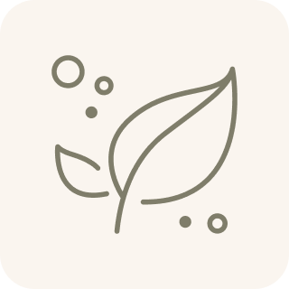 A line drawing of a plant with two leaves, surrounded by small circles and dots.