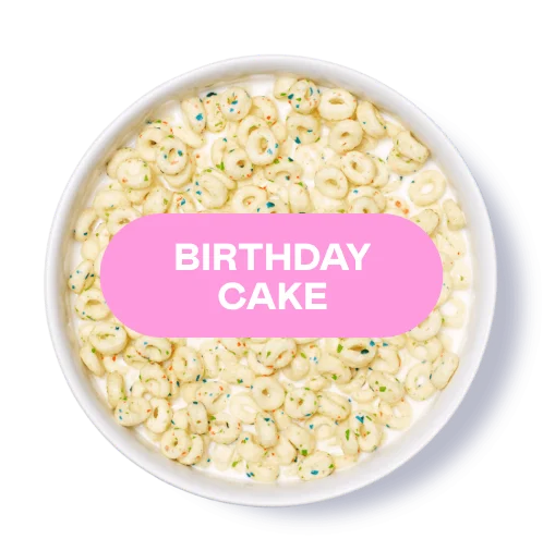 Bowl of cereal with sprinkles labeled 'Birthday Cake' on a pink banner.