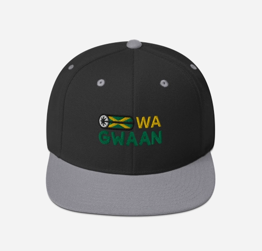 Black and gray cap with 'WA GWAAN' and a flag design.