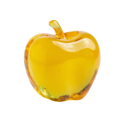 A yellow glass apple with a smooth, shiny surface.