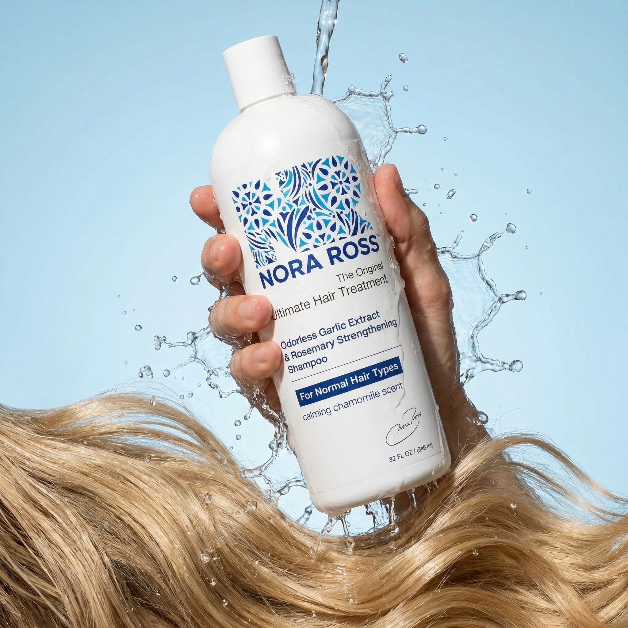 A hand holds a bottle of Nora Ross shampoo as water splashes onto the bottle and blonde hair.