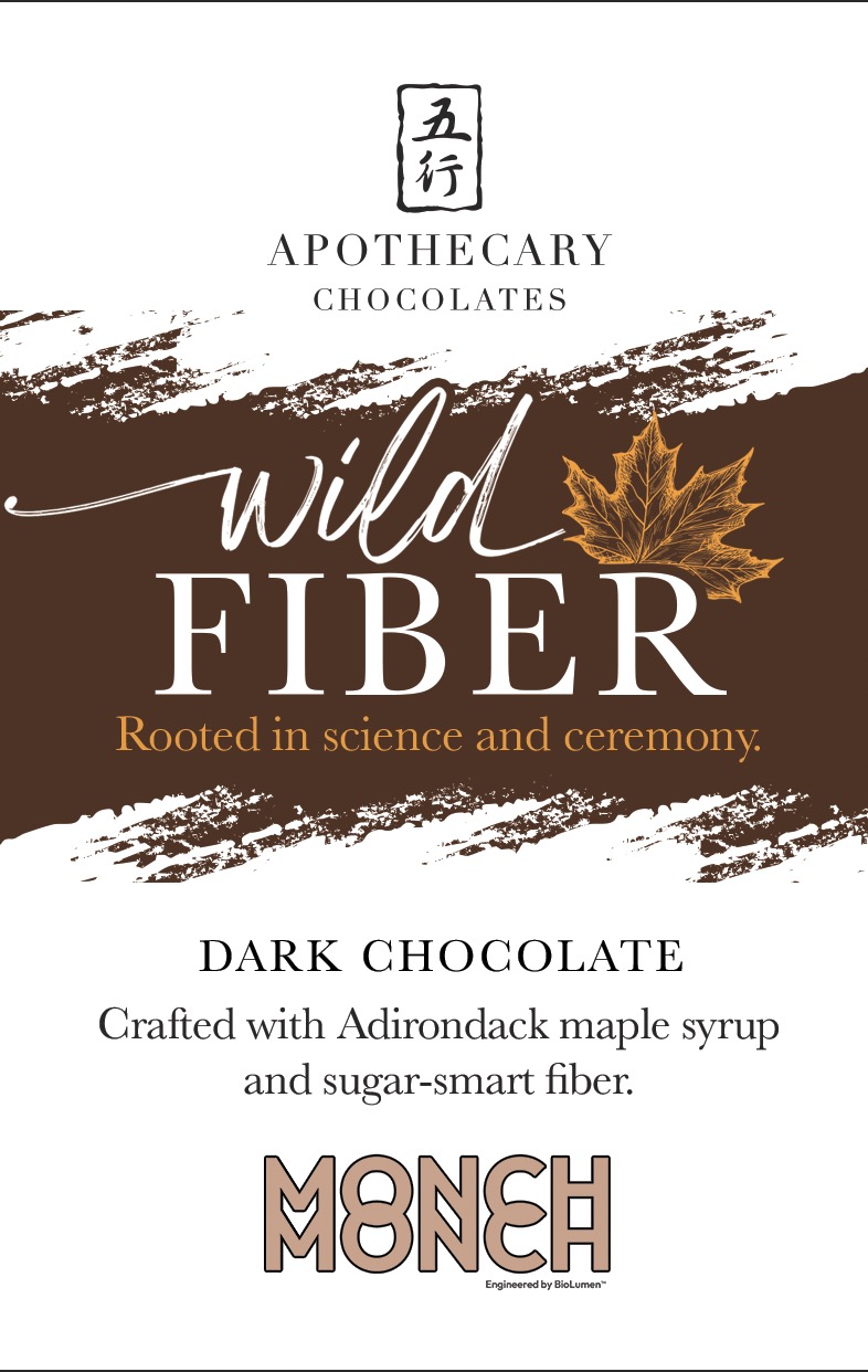 Chocolate packaging with text about dark chocolate and maple syrup, featuring a maple leaf illustration.