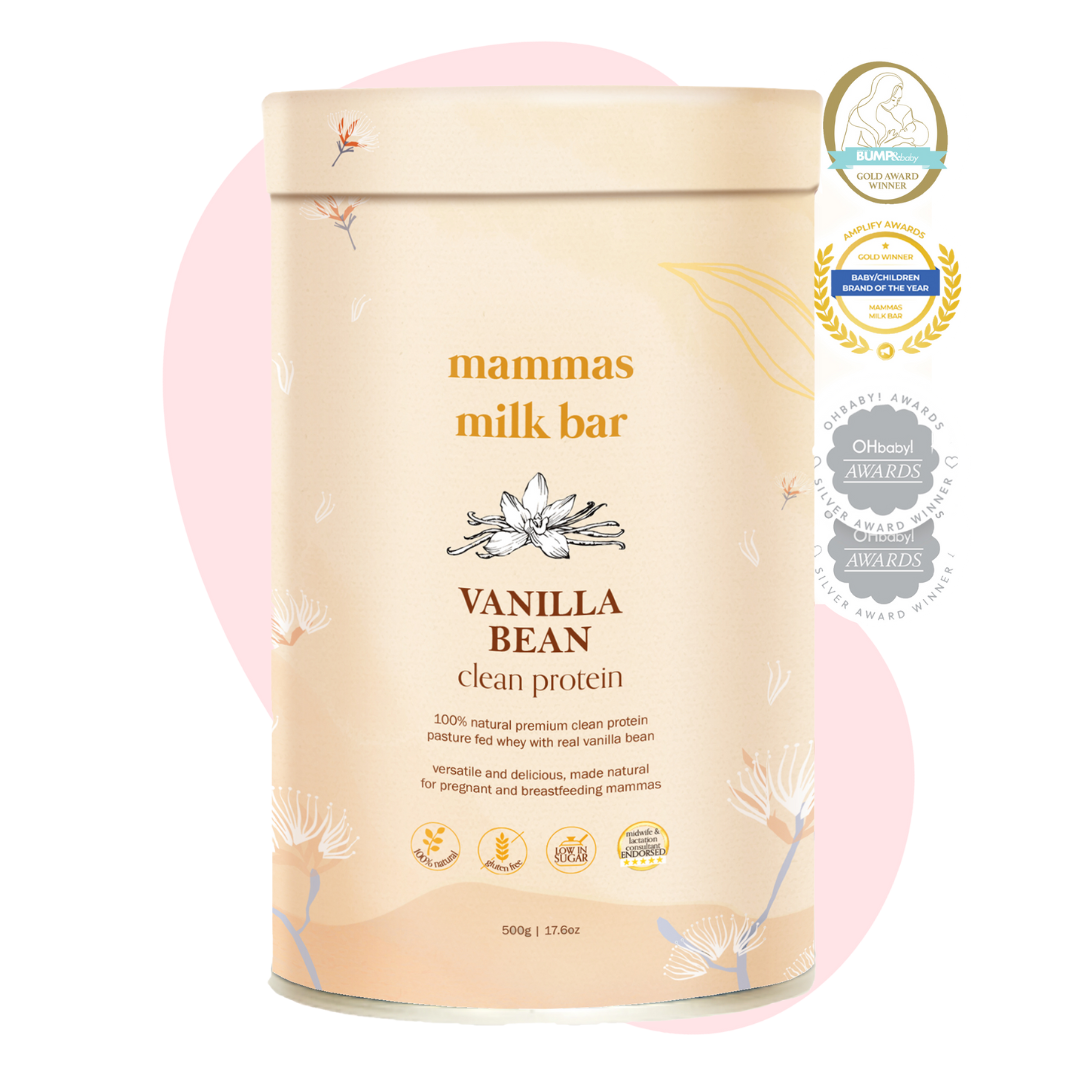 Vanilla bean protein powder container with award badges on a pink background.