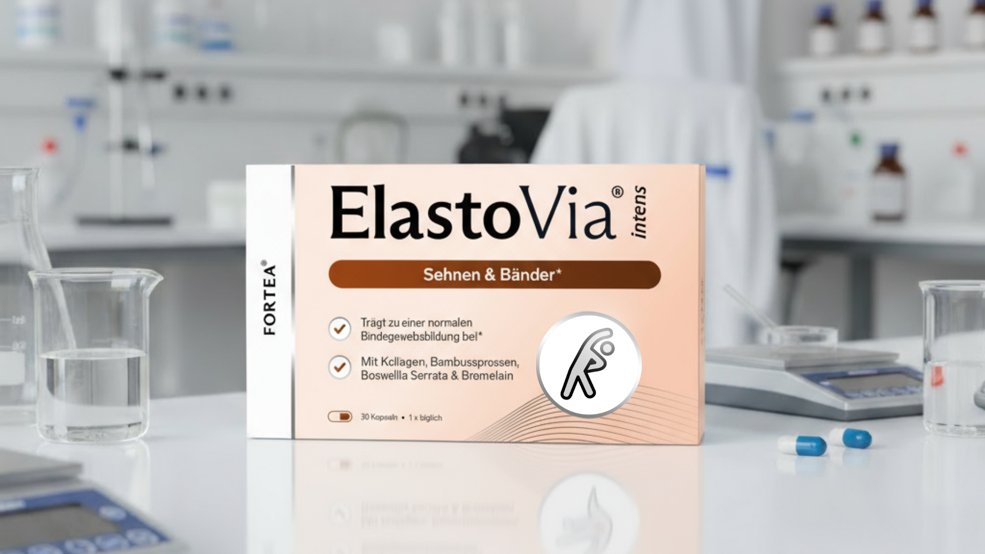 A box of ElastoVia intens supplements sits on a lab counter next to beakers and two capsules.