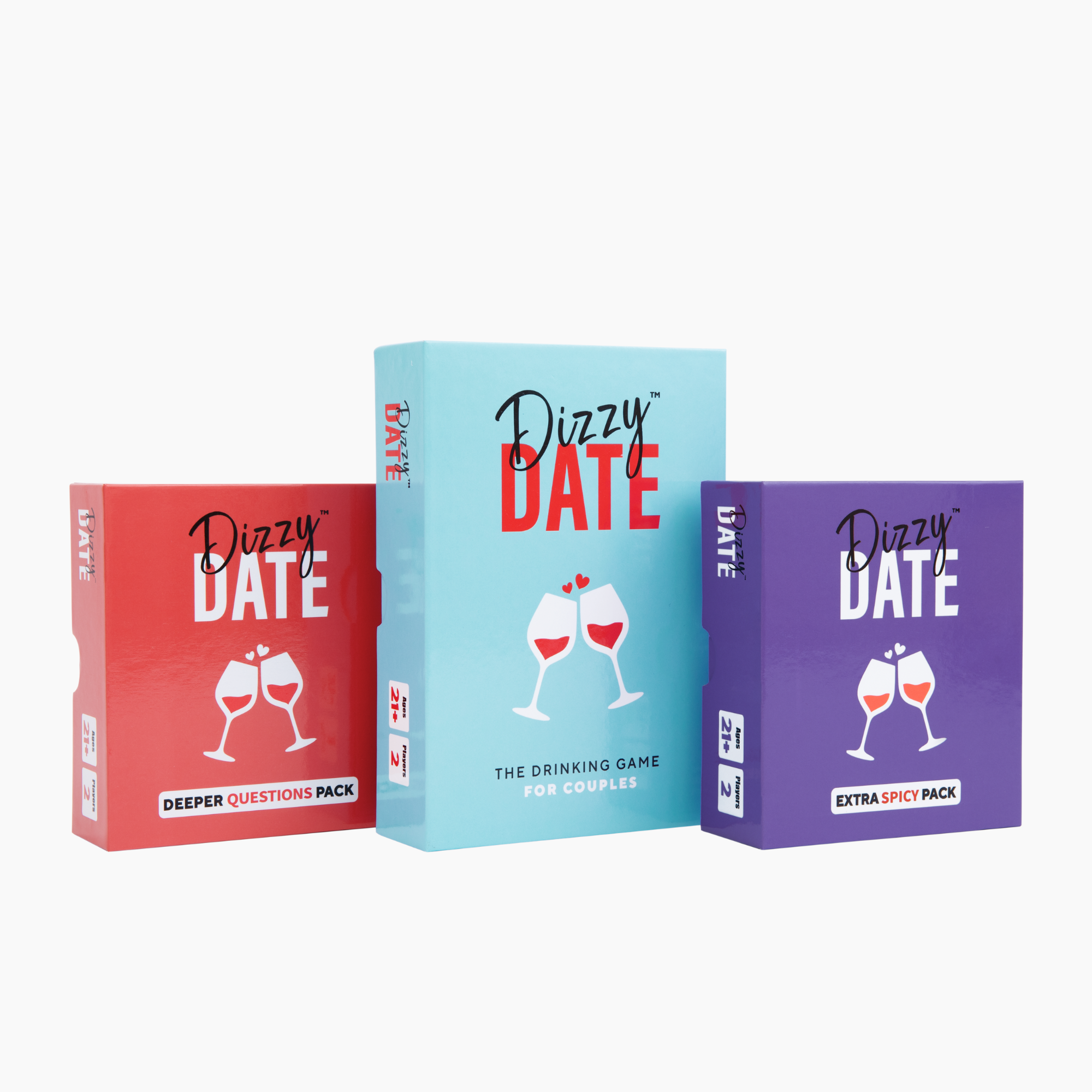 Three colorful boxes of the Dizzy Date card game for couples.