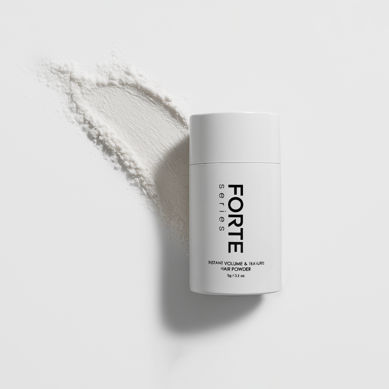 White bottle of hair powder on a white surface with spilled powder.