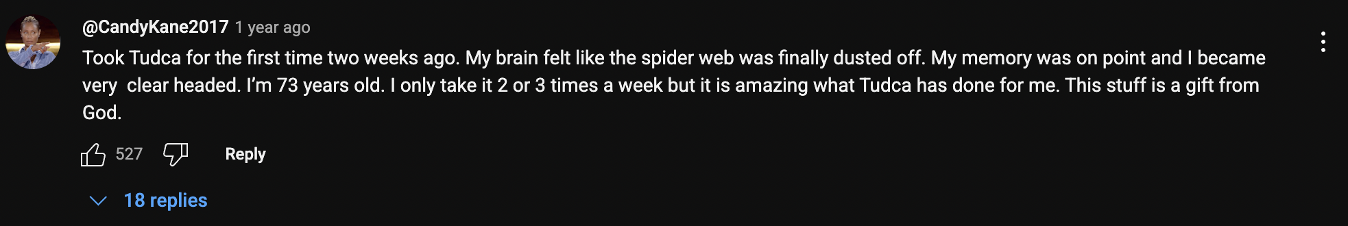 YouTube comment with avatar and reply icon visible.
