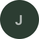 Placeholder image with a dark circle and letter 'J' in the center.