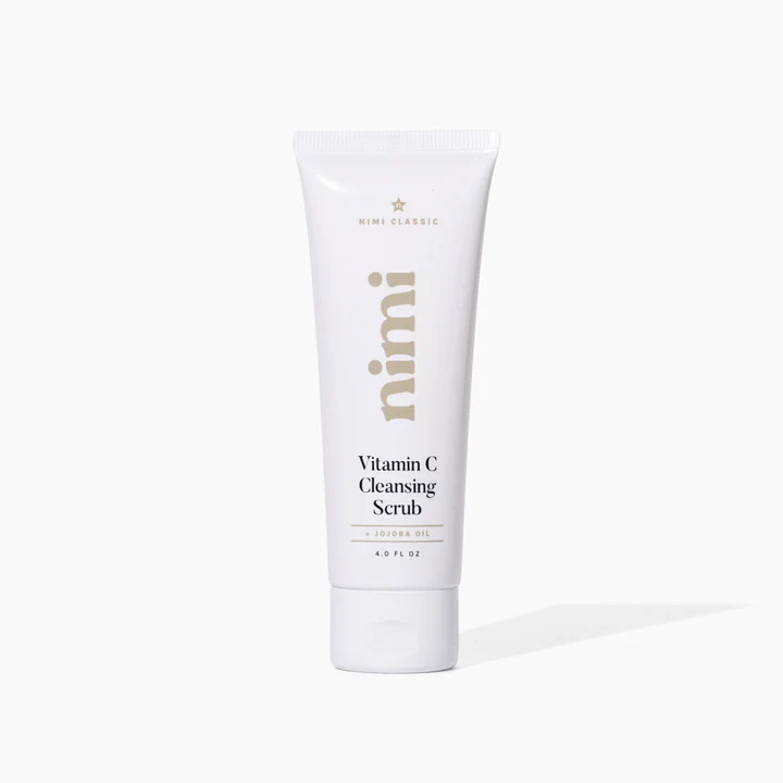 A white tube of Nimi Vitamin C Cleansing Scrub against a plain off-white background.