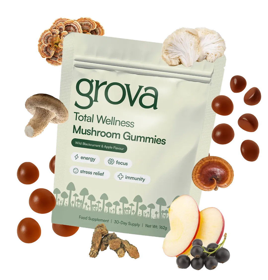 Pouch of Grova Total Wellness Mushroom Gummies pouch surrounded by functional mushrooms, apple slices, blackcurrants, and gummies, promoting energy, focus, stress relief, and immunity.