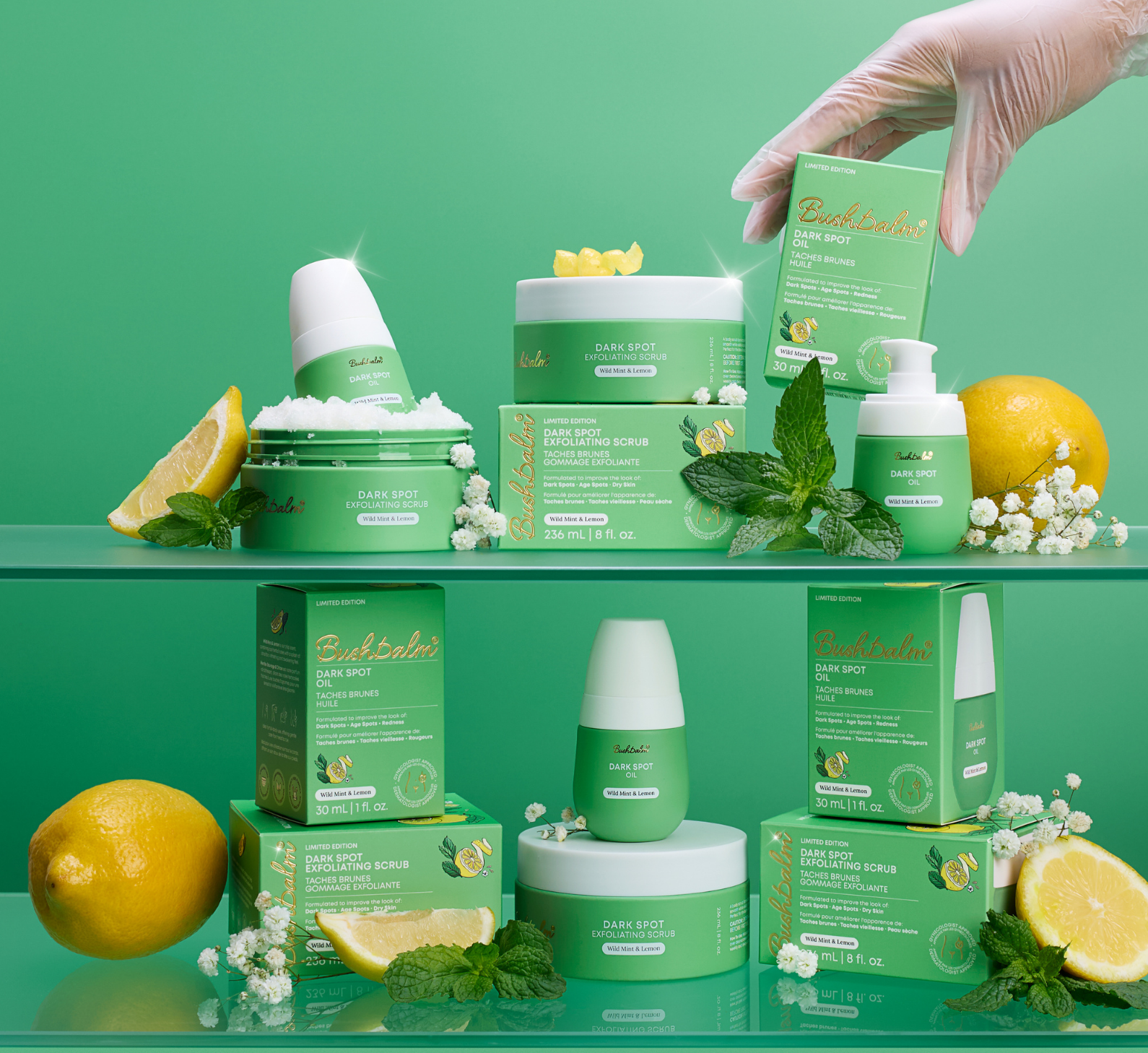 Bushbalm skincare products are arranged on green shelves with lemons, mint, and white flowers.