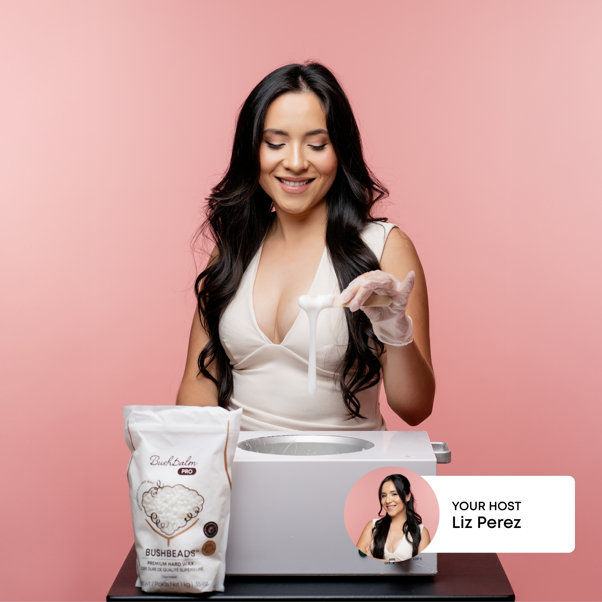 Person preparing wax with a warmer, gloves, and a product package, against a pink background.
