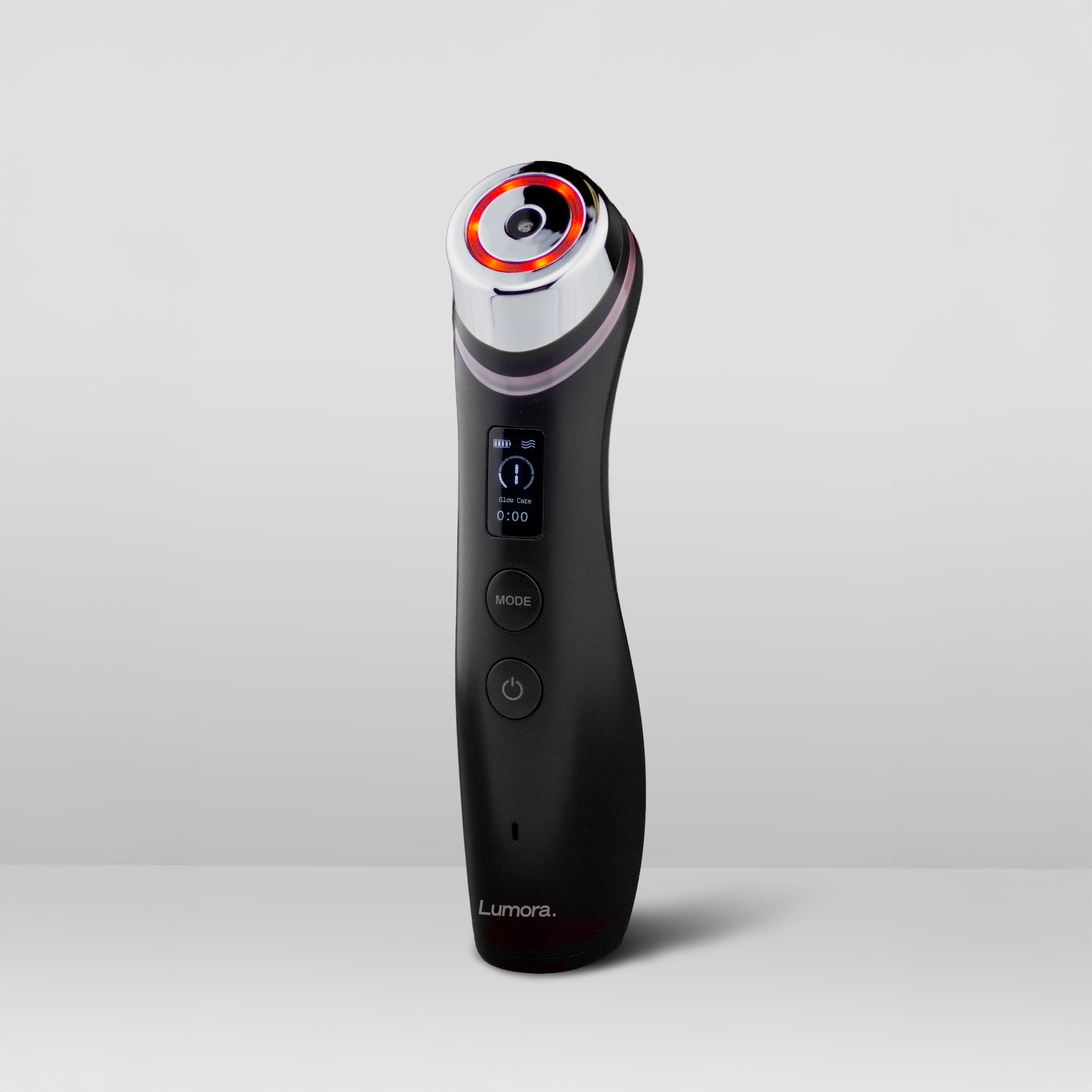 Black handheld device with buttons and a digital display on a white background.