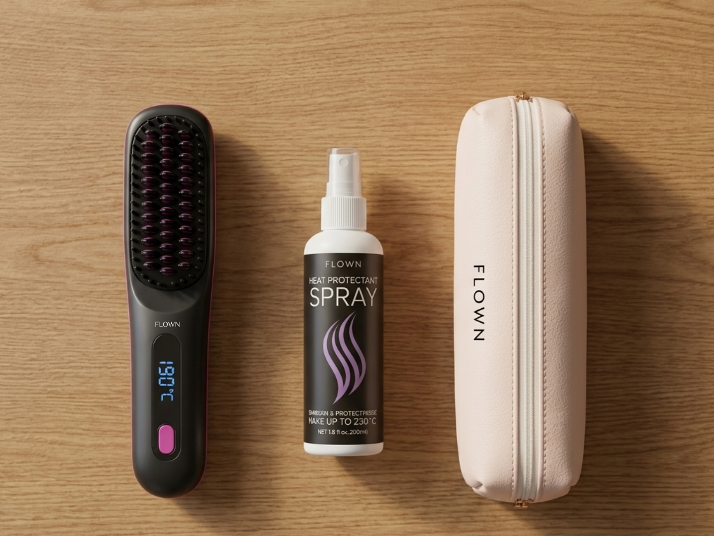 A Flown heated hairbrush, heat protectant spray, and carrying case on a wooden surface.