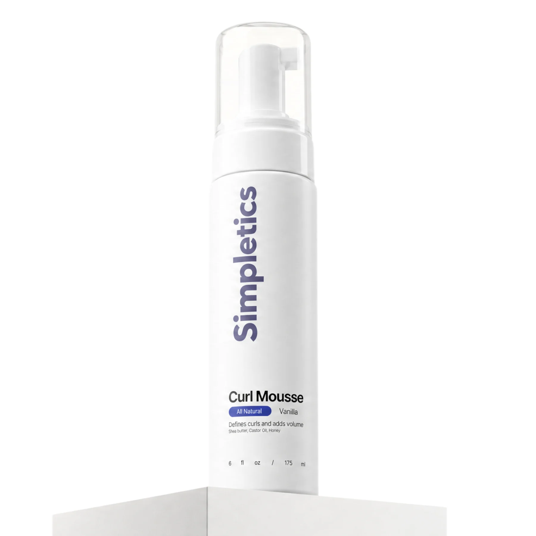 A white pump bottle of Simpletics Curl Mousse standing on a white block against a white background.