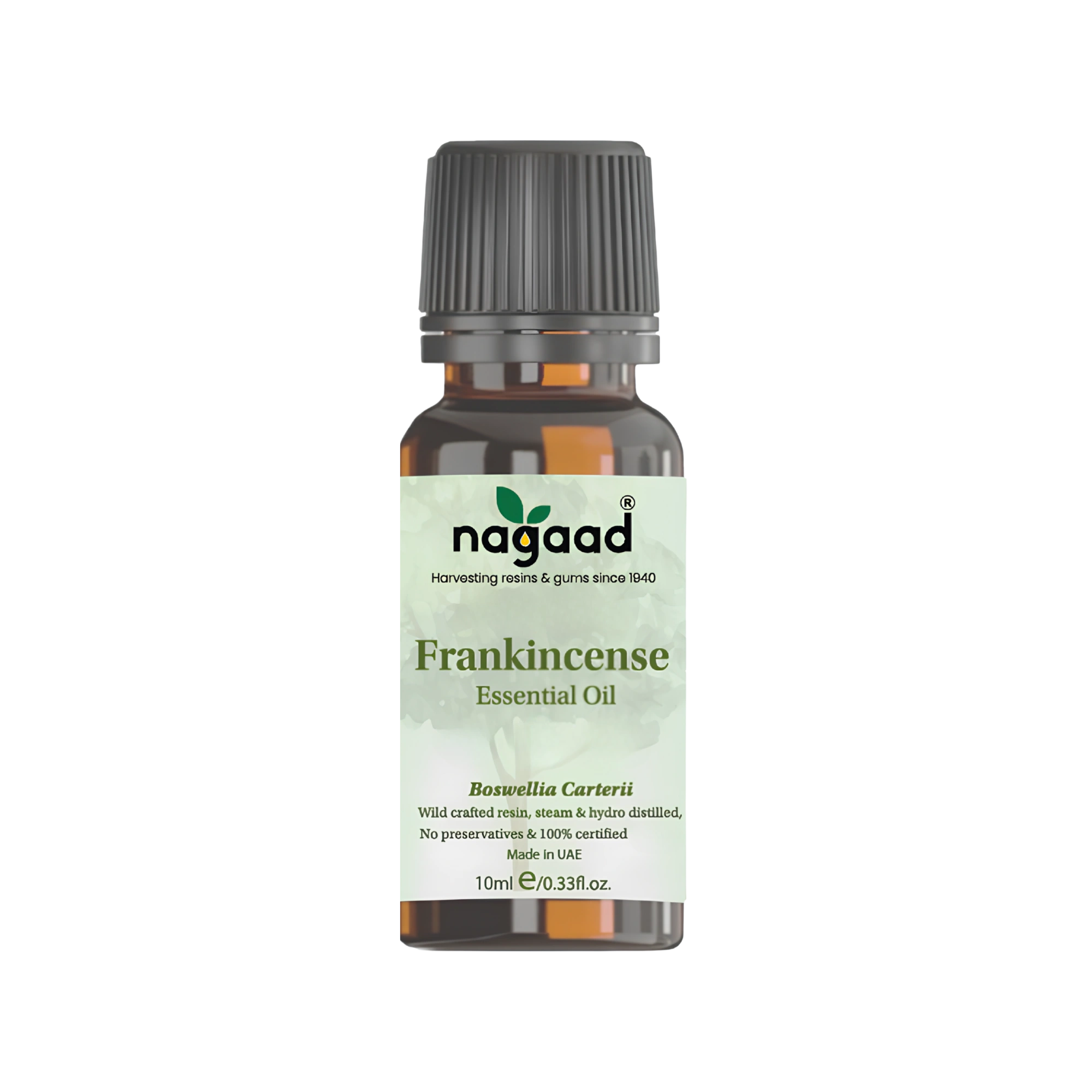 Bottle of frankincense essential oil with a green label on a white background.