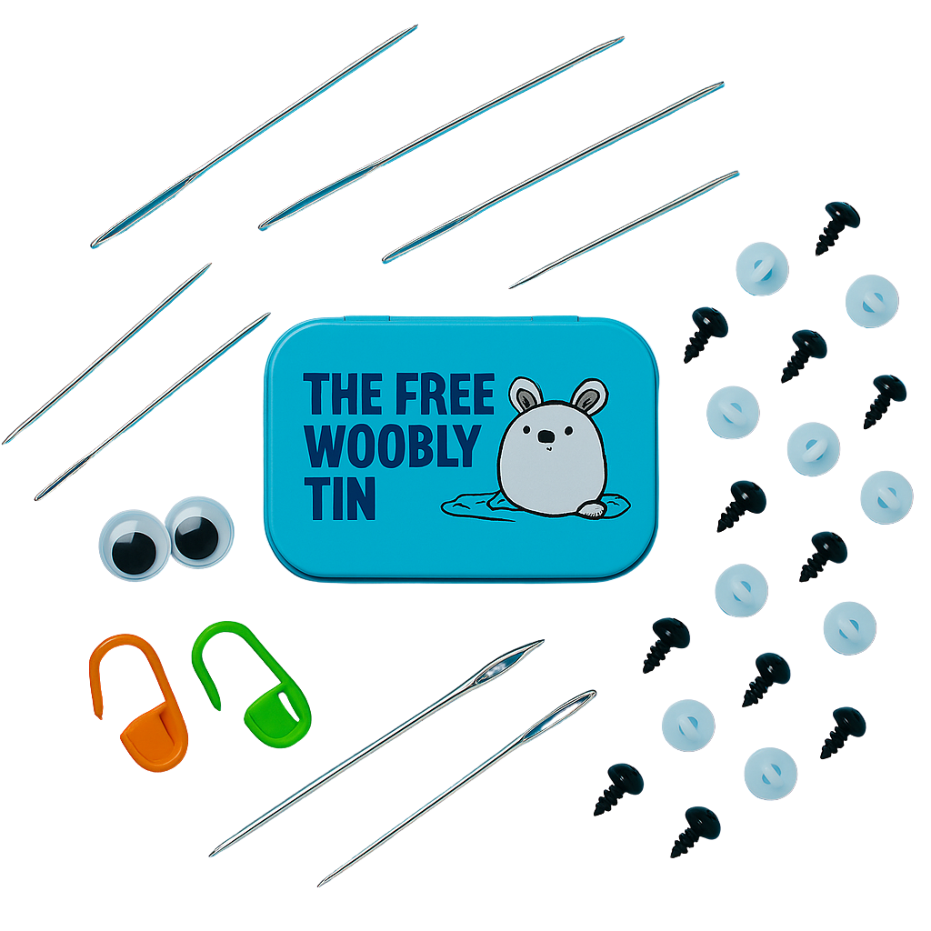 Craft kit with needles, safety eyes, and stitch markers around a blue tin.