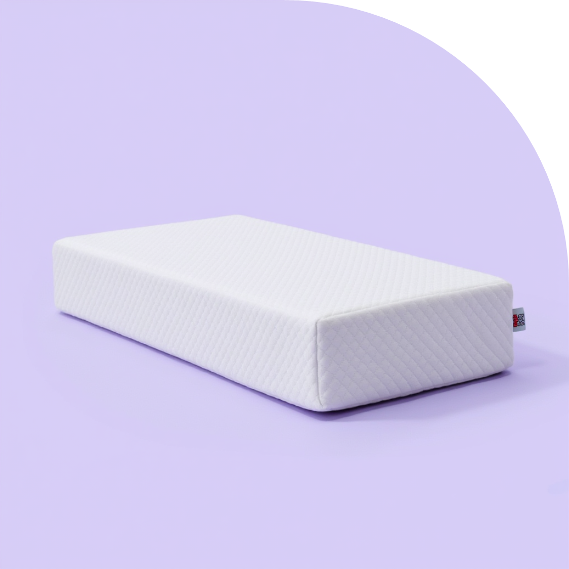 White rectangular mattress on a light purple background.