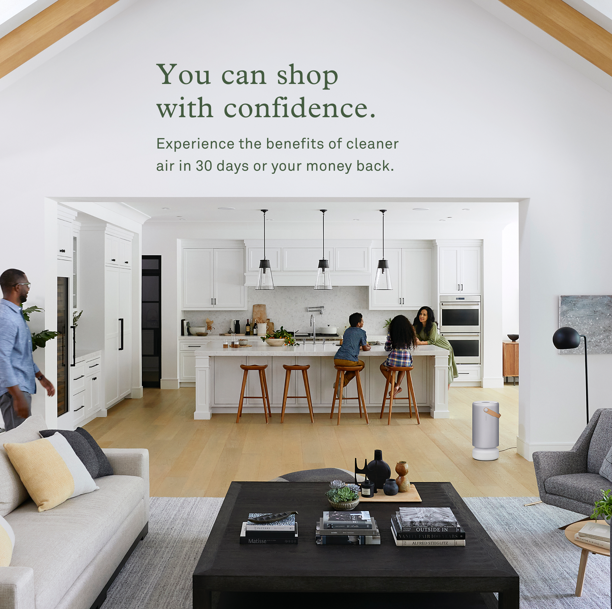 Modern kitchen and living room with people, text about shopping with confidence.