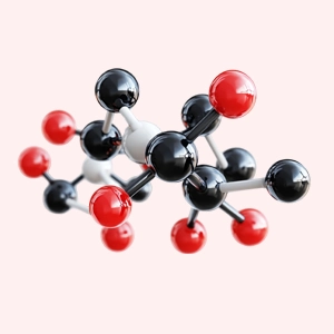 Colorful molecular model with red, black, and white spheres on a pink background.