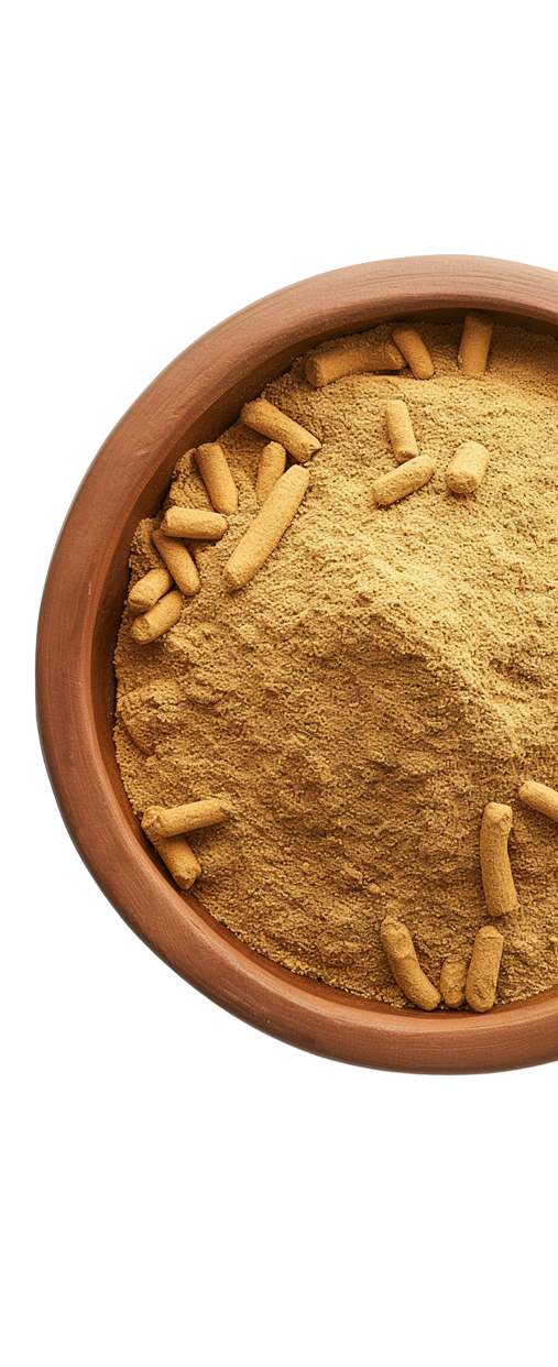 Brown powder with pellets in a wooden bowl.