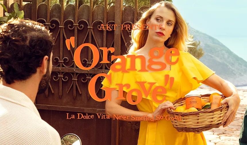 A woman in a yellow dress holds a basket of oranges and products, looking at a man.