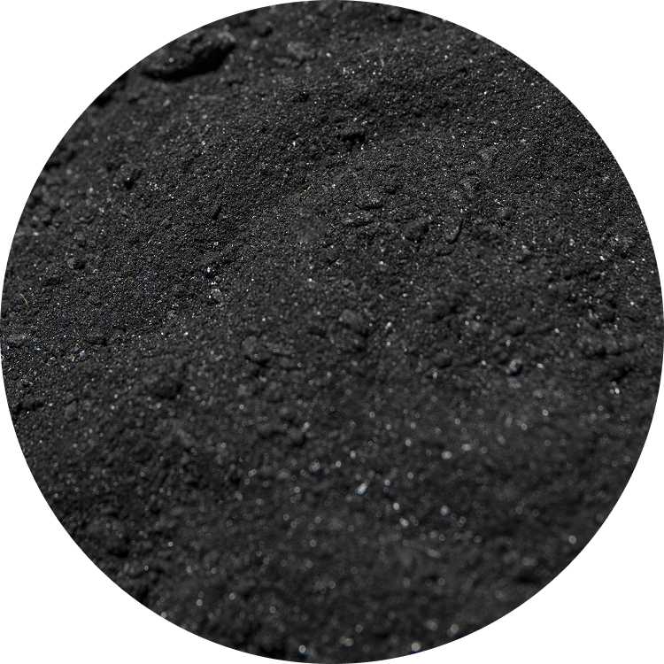 Close-up of black granular material with a rough texture.