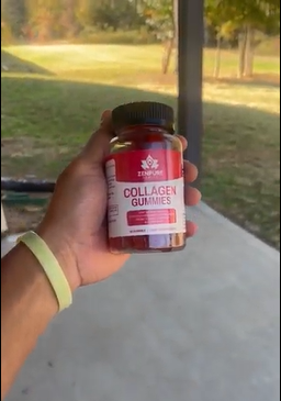 Hand holding a jar of collagen gummies outside on a patio.