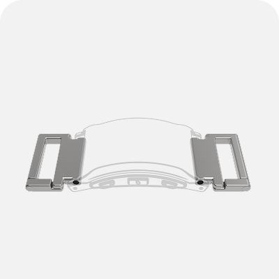 Gray mechanical component with rectangular ends and curved top surface.