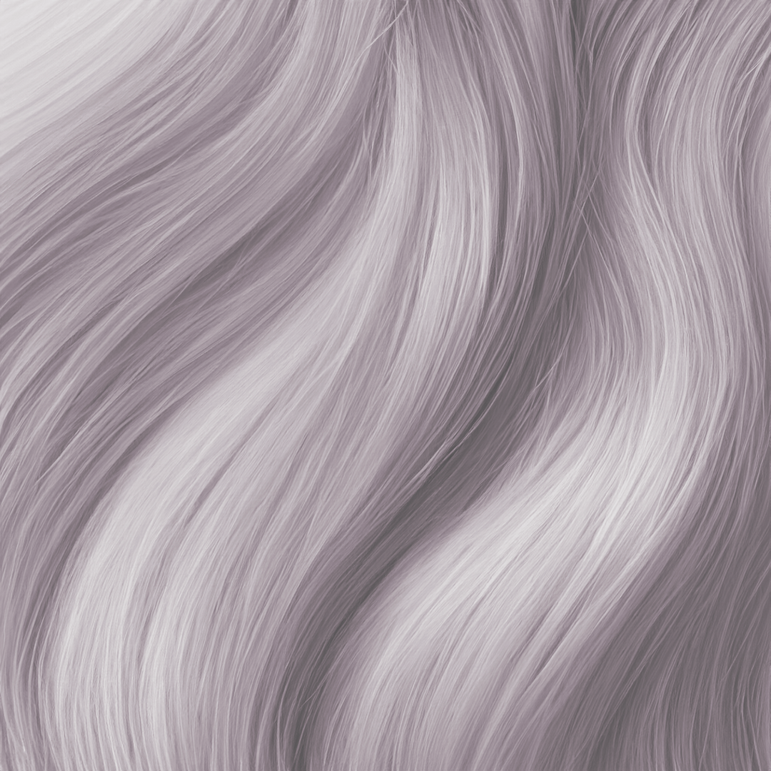 A close-up shot of smooth, wavy hair with a light purple tint.
