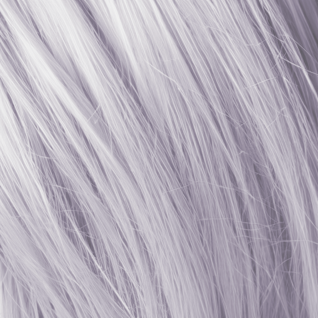 A close-up swatch of long, wavy, silvery-lavender hair.