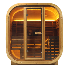 Wooden infrared sauna with glass door and warm lighting.