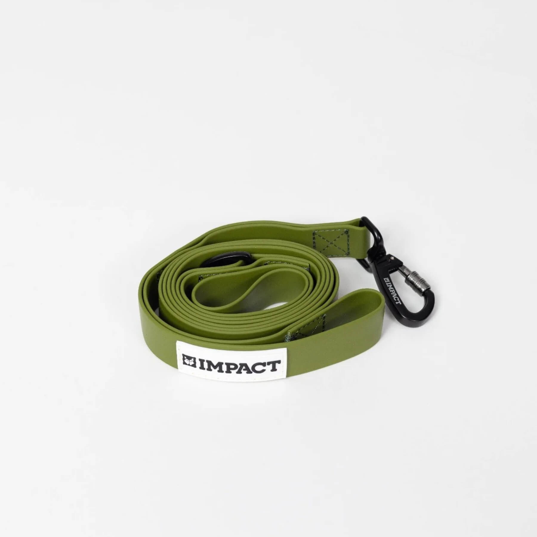 Green coiled strap with a black carabiner and 'IMPACT' label on a white background.