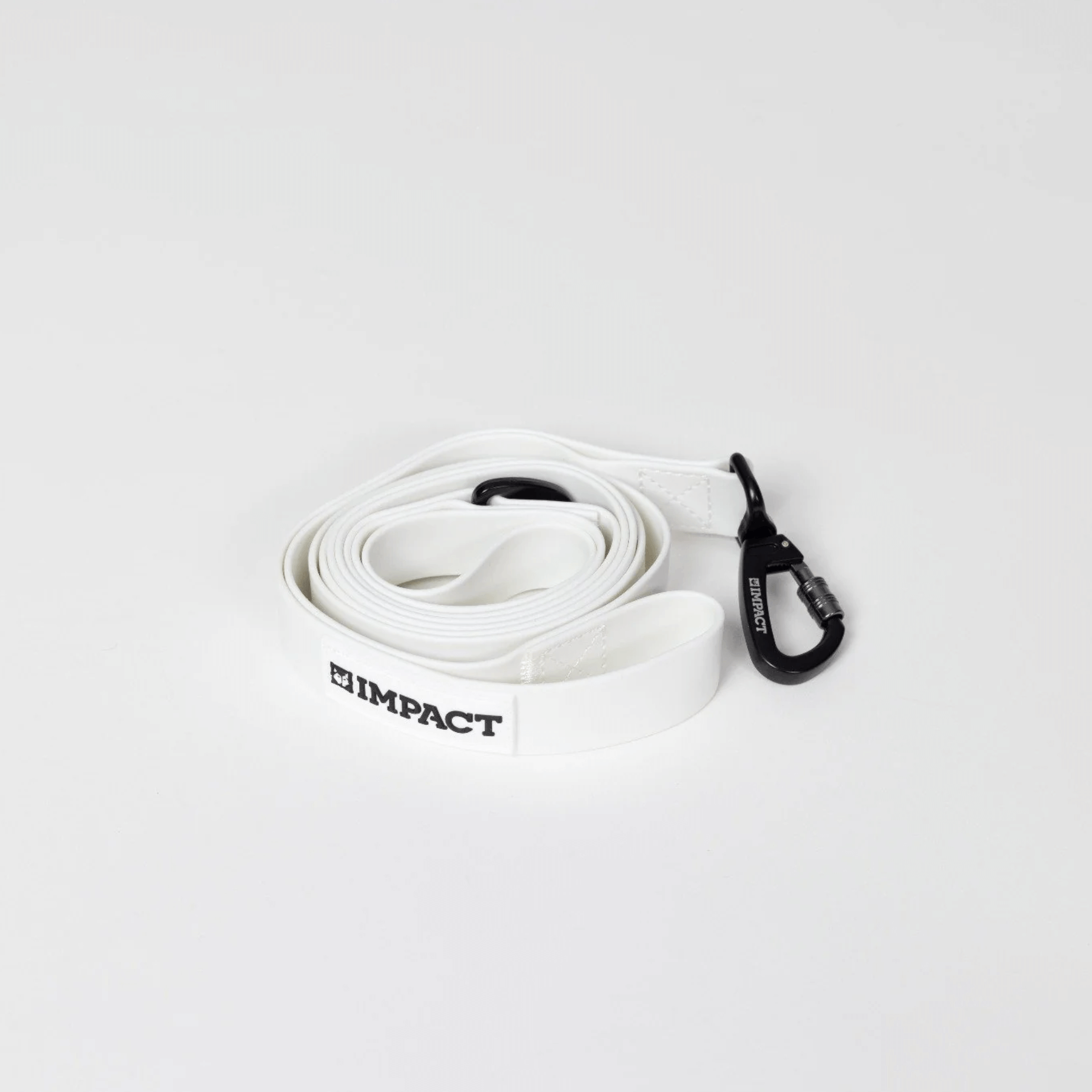 Coiled white strap with black carabiner and 'Impact' branding.