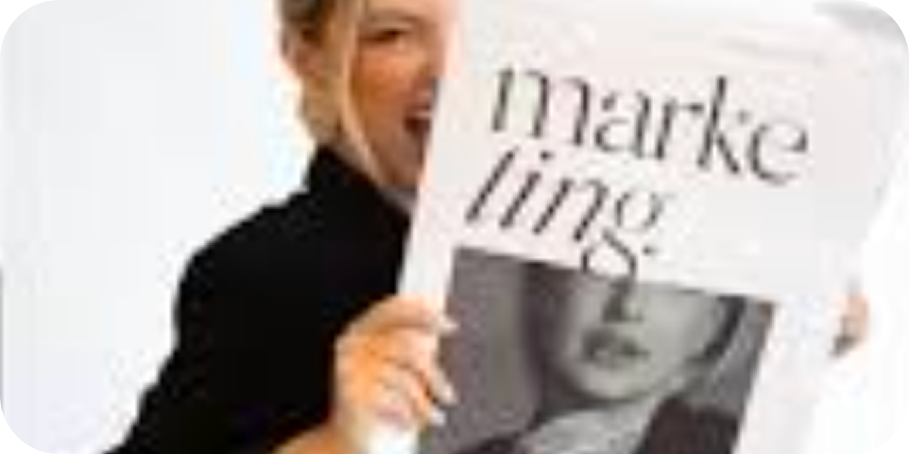 A woman peeks out from behind a newspaper that has the word 'marketing' on it.