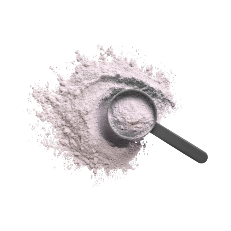 An overhead view of a pile of white powder with a gray measuring scoop resting on top.