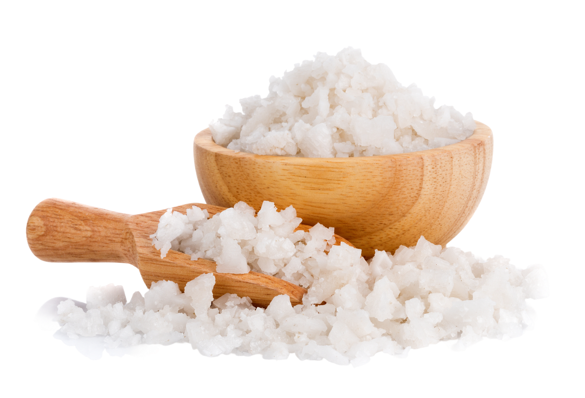 Wooden bowl and scoop filled with coarse salt.