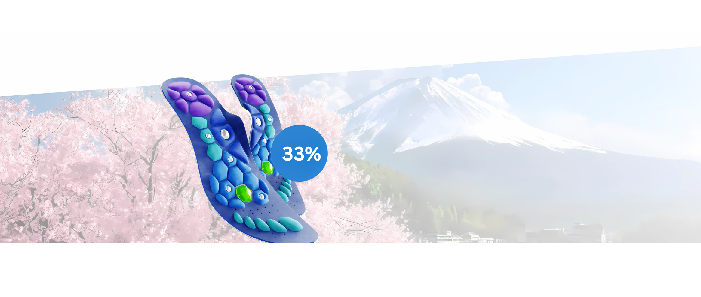 Colorful insoles with a 33% label, cherry blossoms, and a snow-capped mountain in the background.