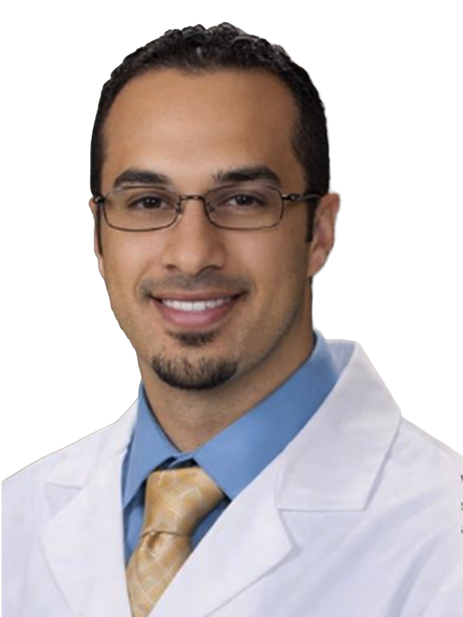 Headshot of a smiling man with glasses and a goatee wearing a white coat over a shirt and tie.